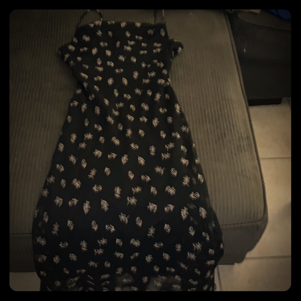 Spaghetti strap dress in black with white flowers